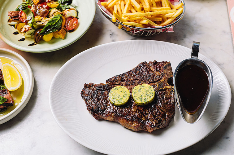 steak with butter and gravy food shot 